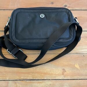 lululemon athletica Black Crossbody Bag with Adjustable Strap and Durable Fabric
